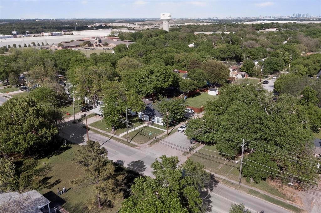 602 North Bagdad Road Grand Prairie, TX 75050 - Photo 4 of 39 an aerial view of a house with a yard