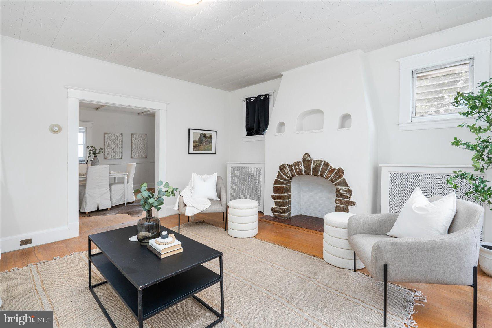 4407 Harcourt Road Baltimore, MD 21214 - Photo 2 of 39 Living room with fireplace