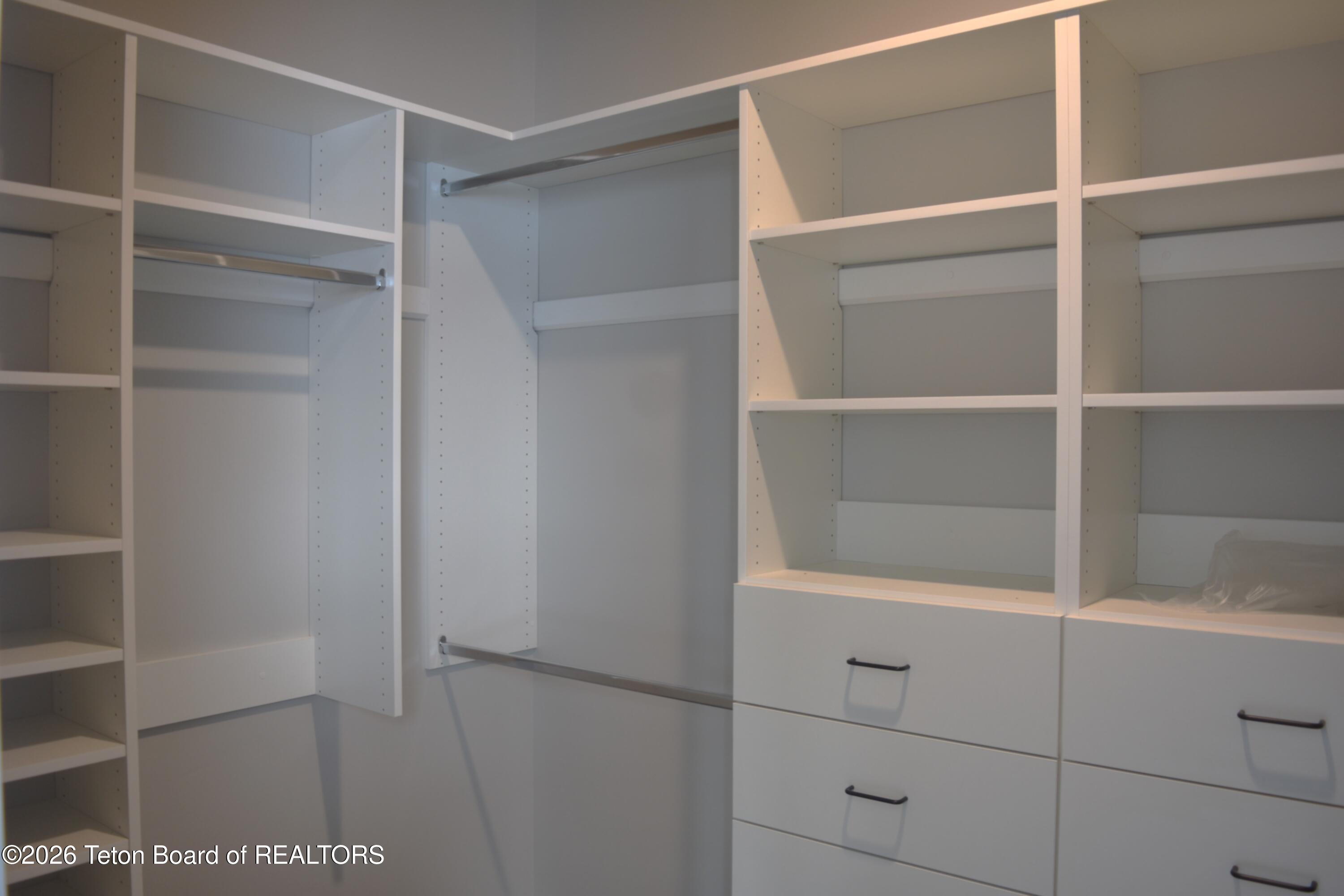 626 Little Greys Loop Etna, WY 83118 - Photo 11 of 16 626 Little Greys Loop Master Closet 1