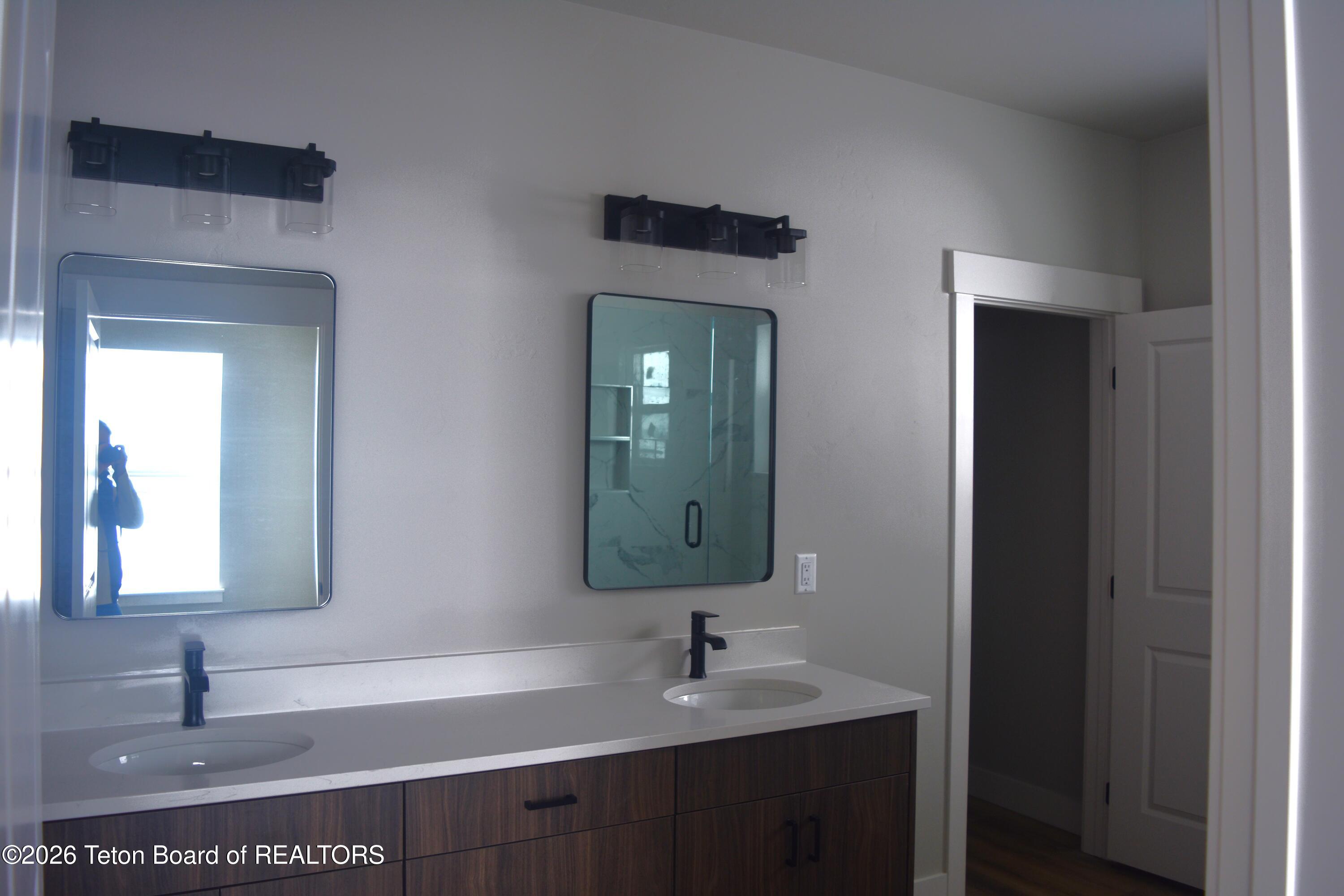 626 Little Greys Loop Etna, WY 83118 - Photo 13 of 16 626 Little Greys Loop Master Bath 1