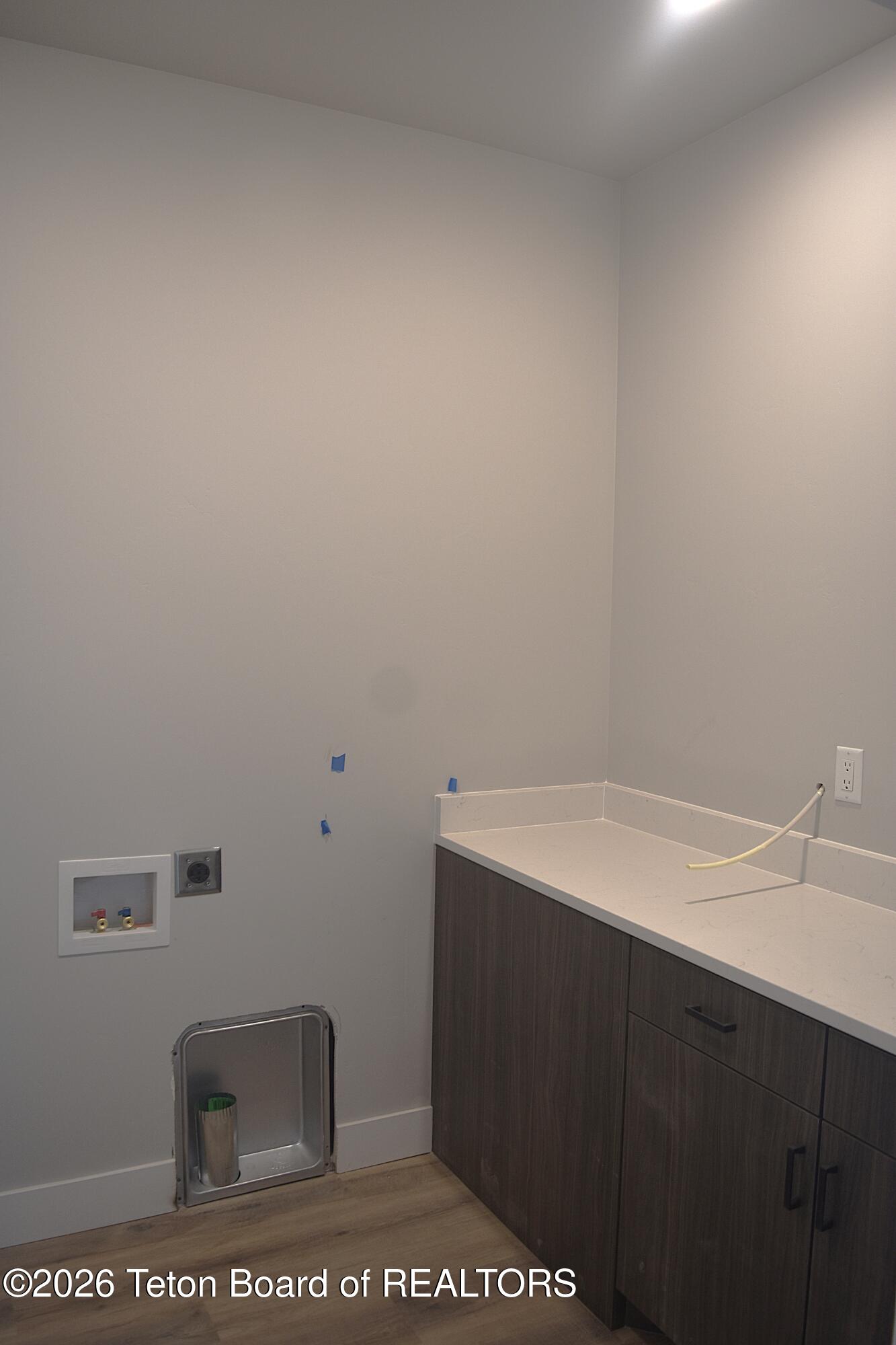 626 Little Greys Loop Etna, WY 83118 - Photo 15 of 16 626 Little Greys Loop Laundry Room