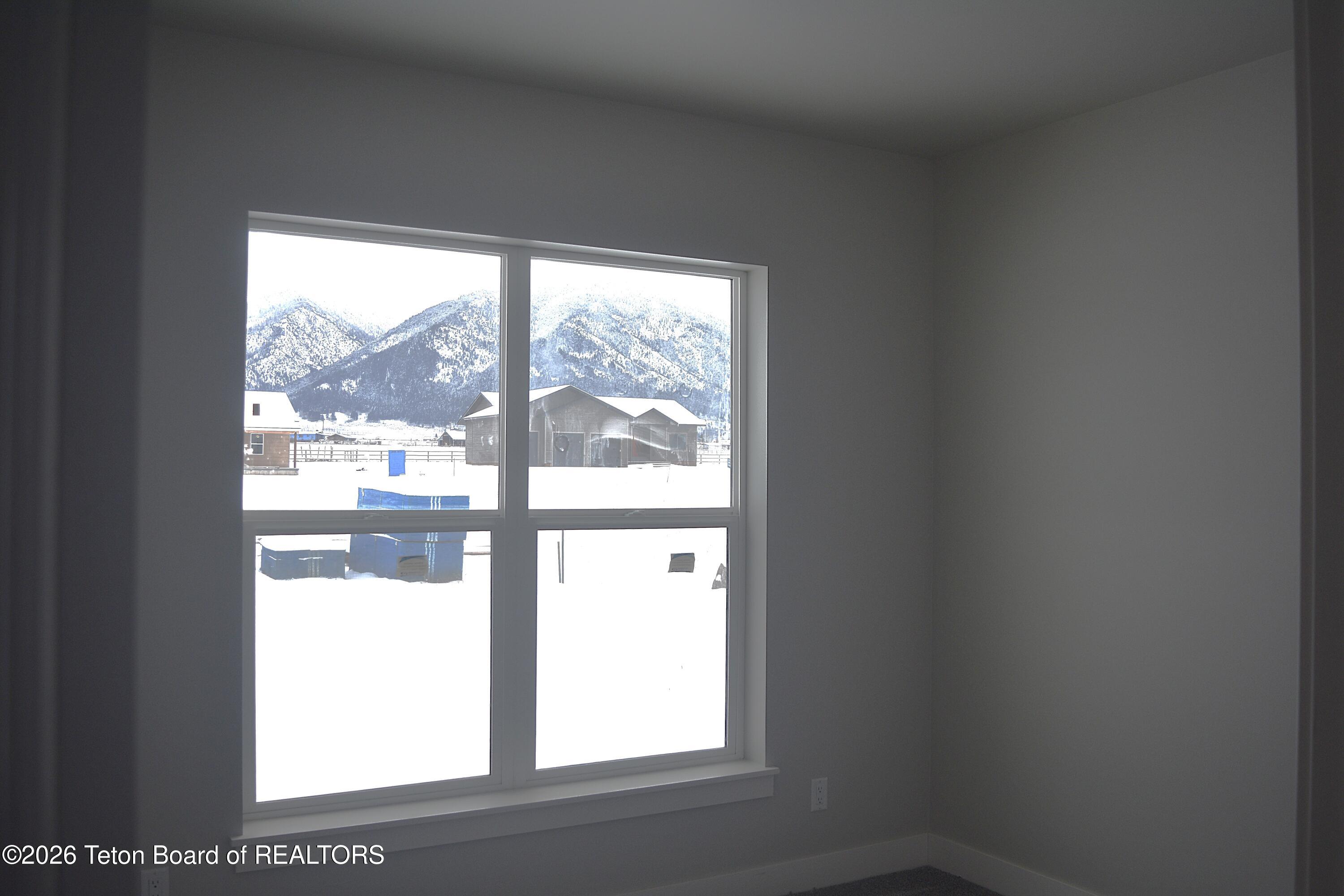 626 Little Greys Loop Etna, WY 83118 - Photo 6 of 16 626 Little Greys Loop Back Bedroom