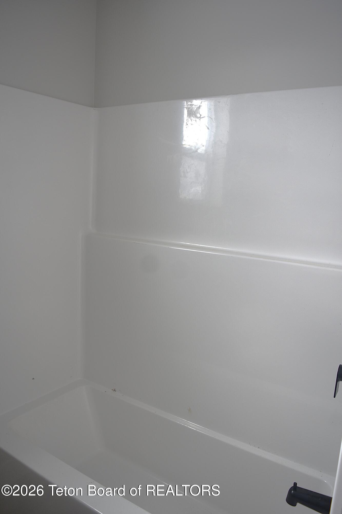 626 Little Greys Loop Etna, WY 83118 - Photo 8 of 16 626 Little Greys Loop Guest Bath Shower