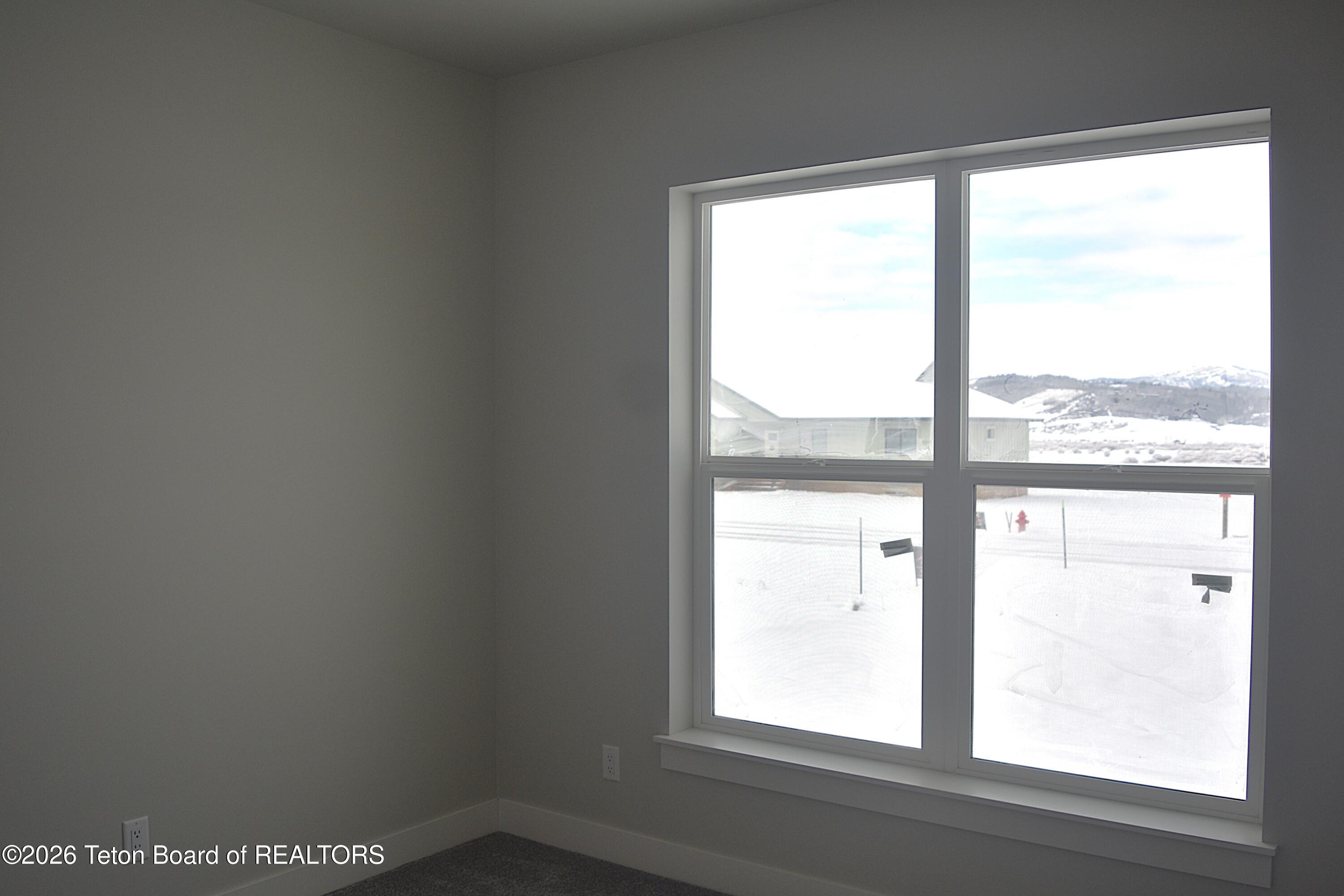 626 Little Greys Loop Etna, WY 83118 - Photo 9 of 16 626 Little Greys Loop Front Bedroom