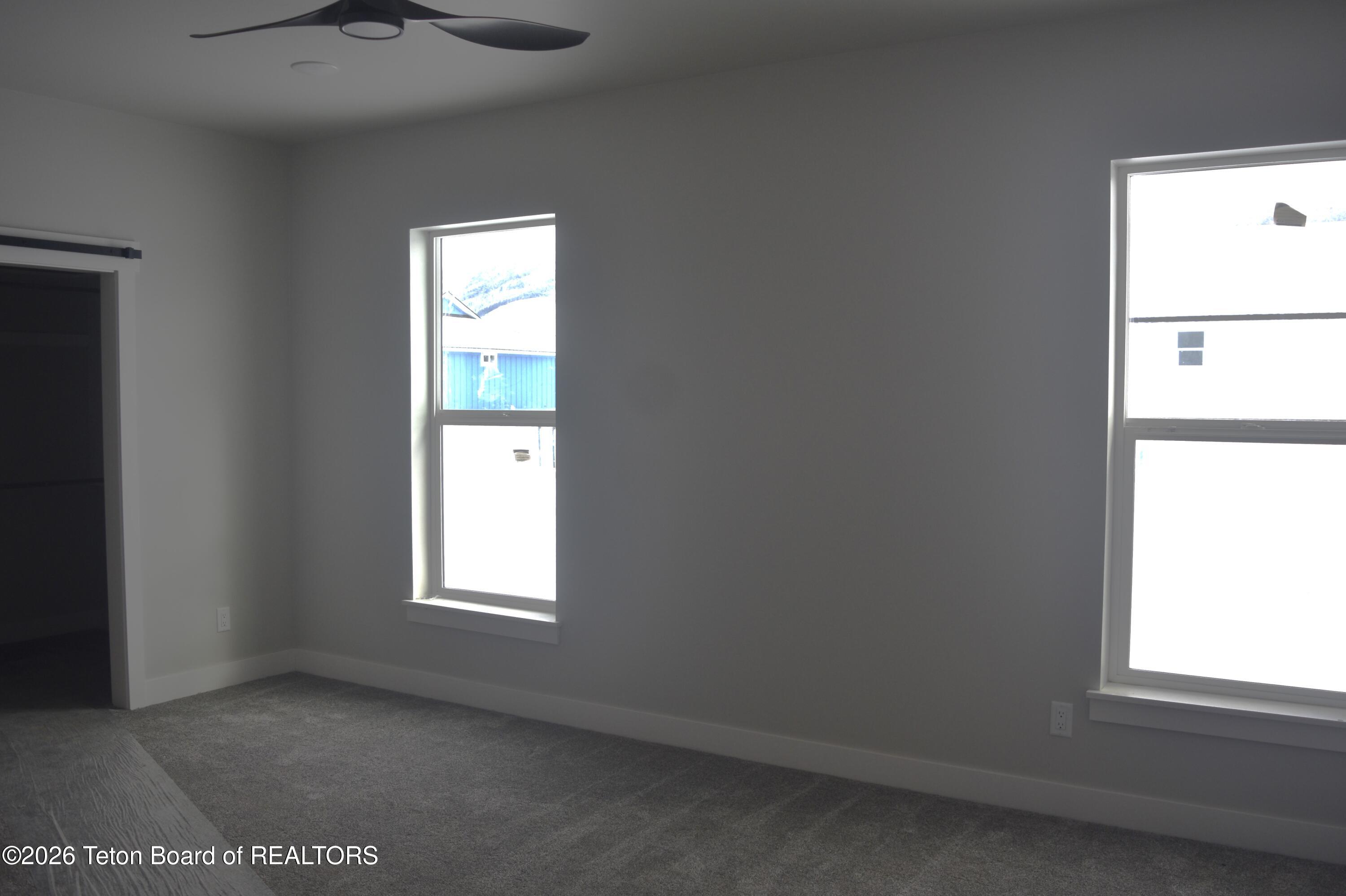 626 Little Greys Loop Etna, WY 83118 - Photo 10 of 16 626 Little Greys Loop Master Bedroom