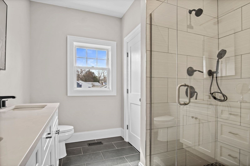 43 Samoset Road Woburn, MA 01801 - Photo 11 of 30 a bathroom with a shower