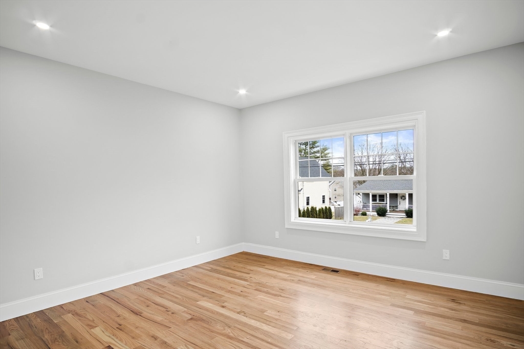 43 Samoset Road Woburn, MA 01801 - Photo 17 of 30 a view of an empty room with a window