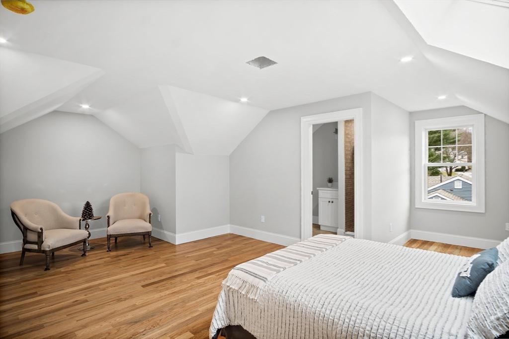 43 Samoset Road Woburn, MA 01801 - Photo 20 of 30 a bedroom with a bed and chair