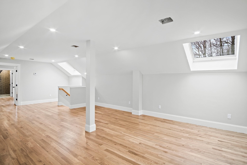 43 Samoset Road Woburn, MA 01801 - Photo 22 of 30 a view of a room with wooden floor