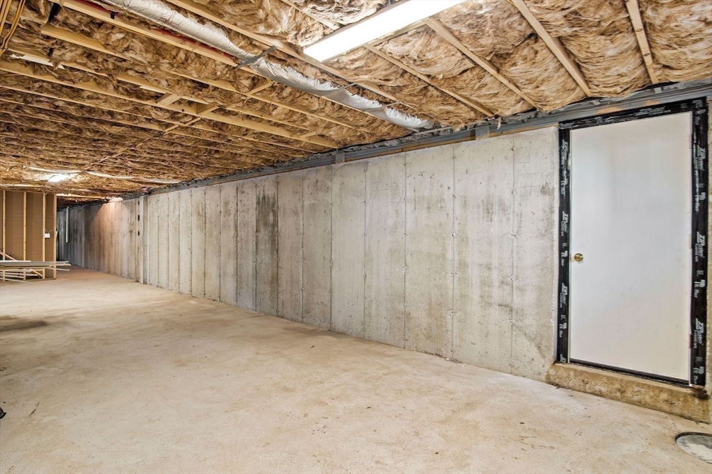 43 Samoset Road Woburn, MA 01801 - Photo 26 of 30 a view of a room with wooden walls