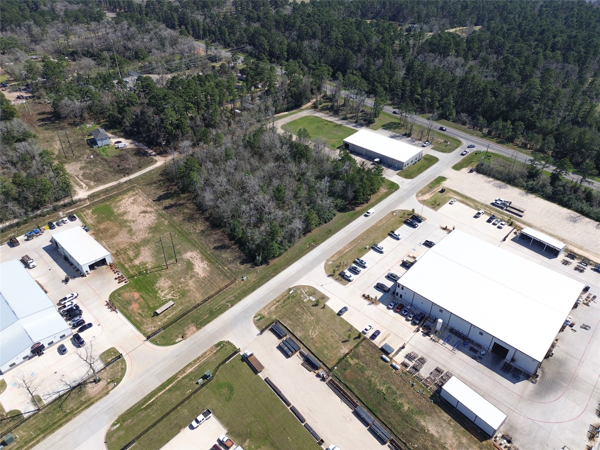 Tbd Cowl Spur Court Conroe, TX 77304 - Photo 12 of 17 an aerial view of a residential houses with yard