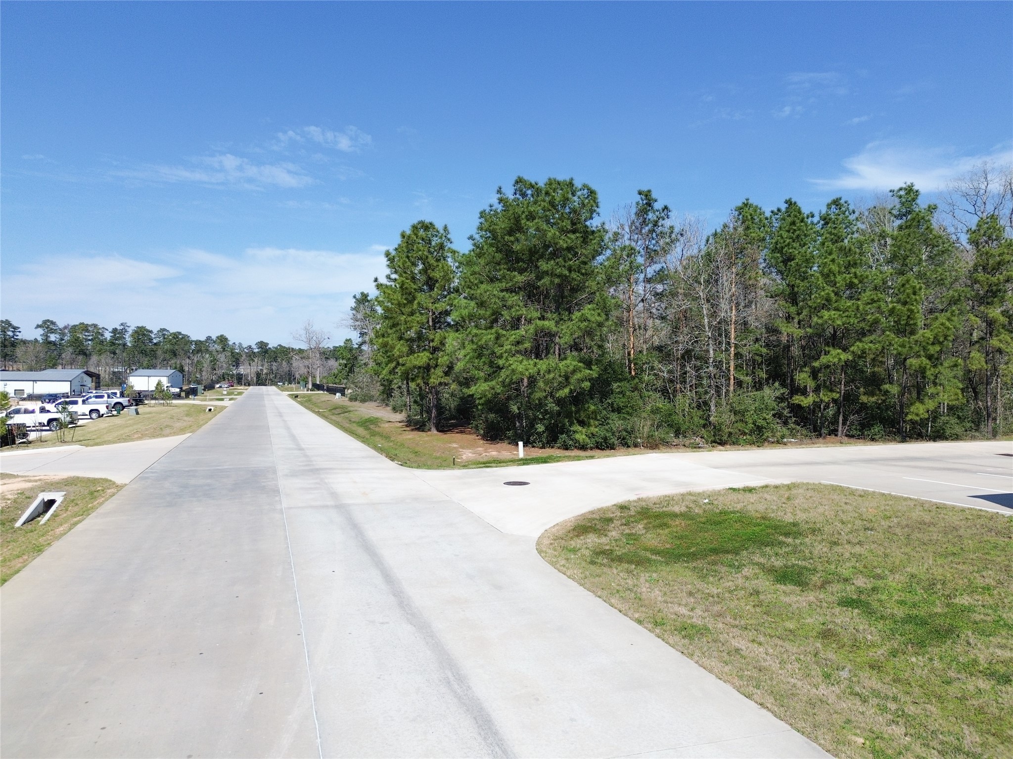 Tbd Cowl Spur Court Conroe, TX 77304 - Photo 9 of 17 a view of a swimming pool with an outdoor space and seating area