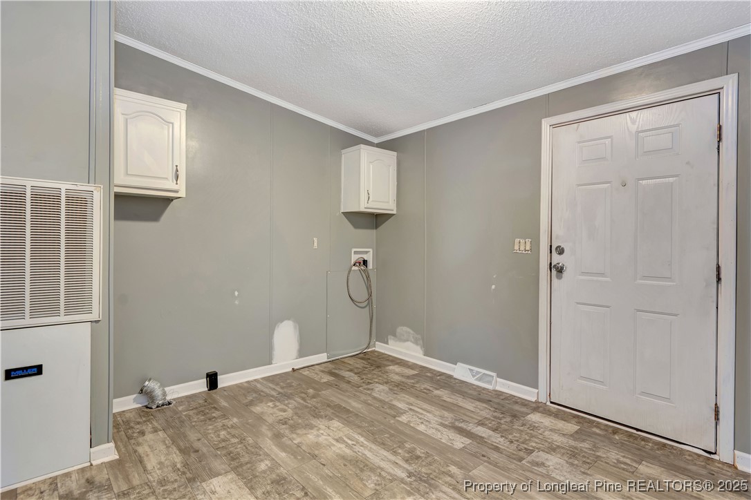 2589 Pleasant Hope Road Fairmont, NC 28340 - Photo 30 of 36 a bedroom with a bed and a window