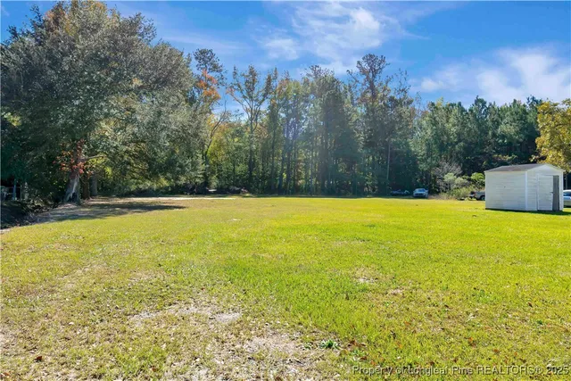 a picture of a room with a refrigerator