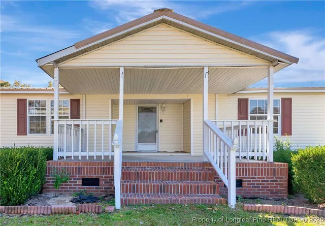a front view of a house with balcony