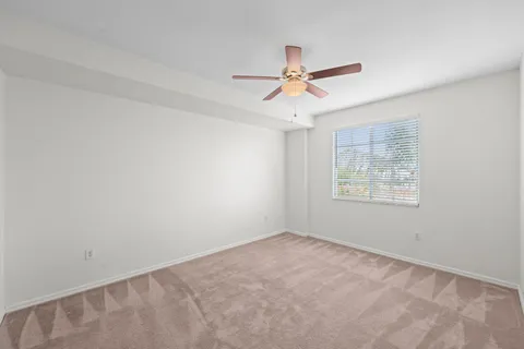 a view of living room with furniture and fireplace