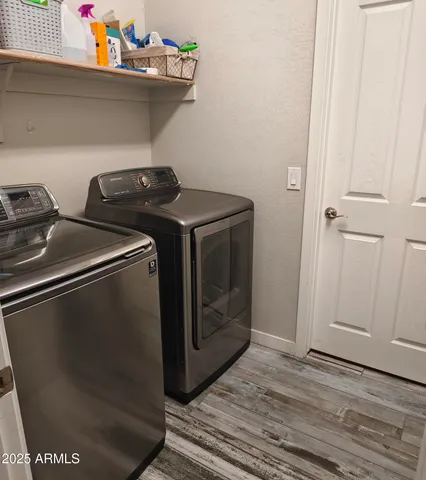 a utility room with dryer and washer