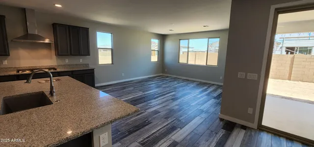 a living room with a couch and a fireplace