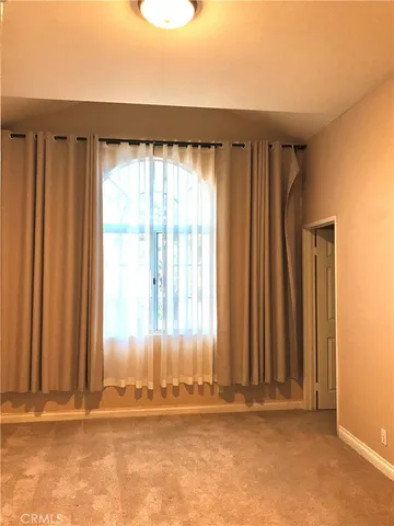 an empty room with window