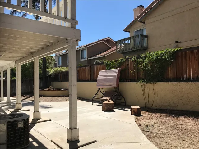 a house view with a outdoor space