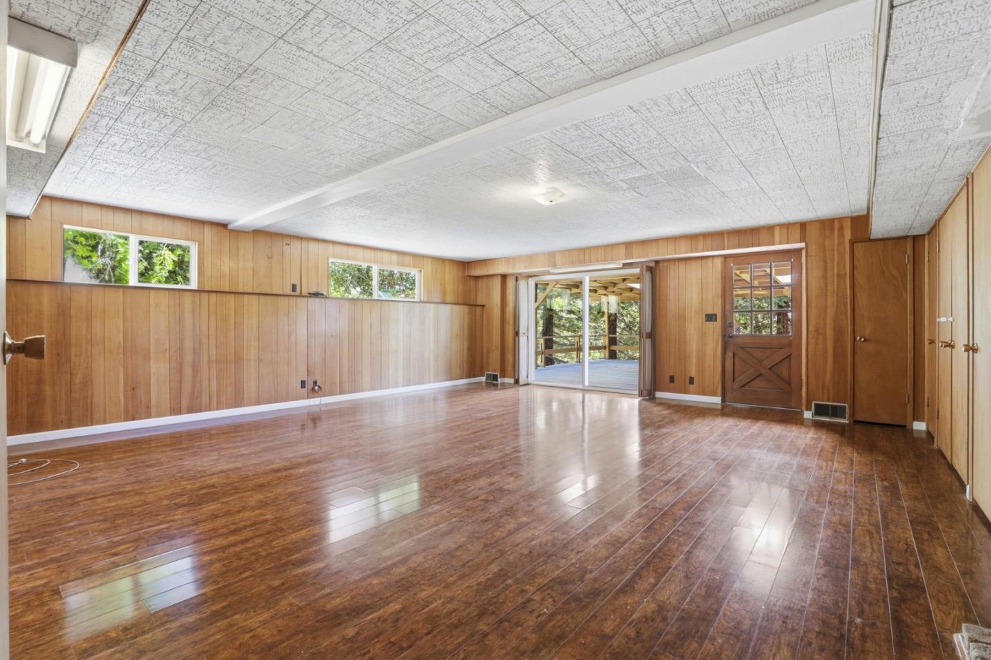 208 Mill Creek Road Fremont, CA 94539 - Photo 10 of 59 an empty room with wooden floor and windows