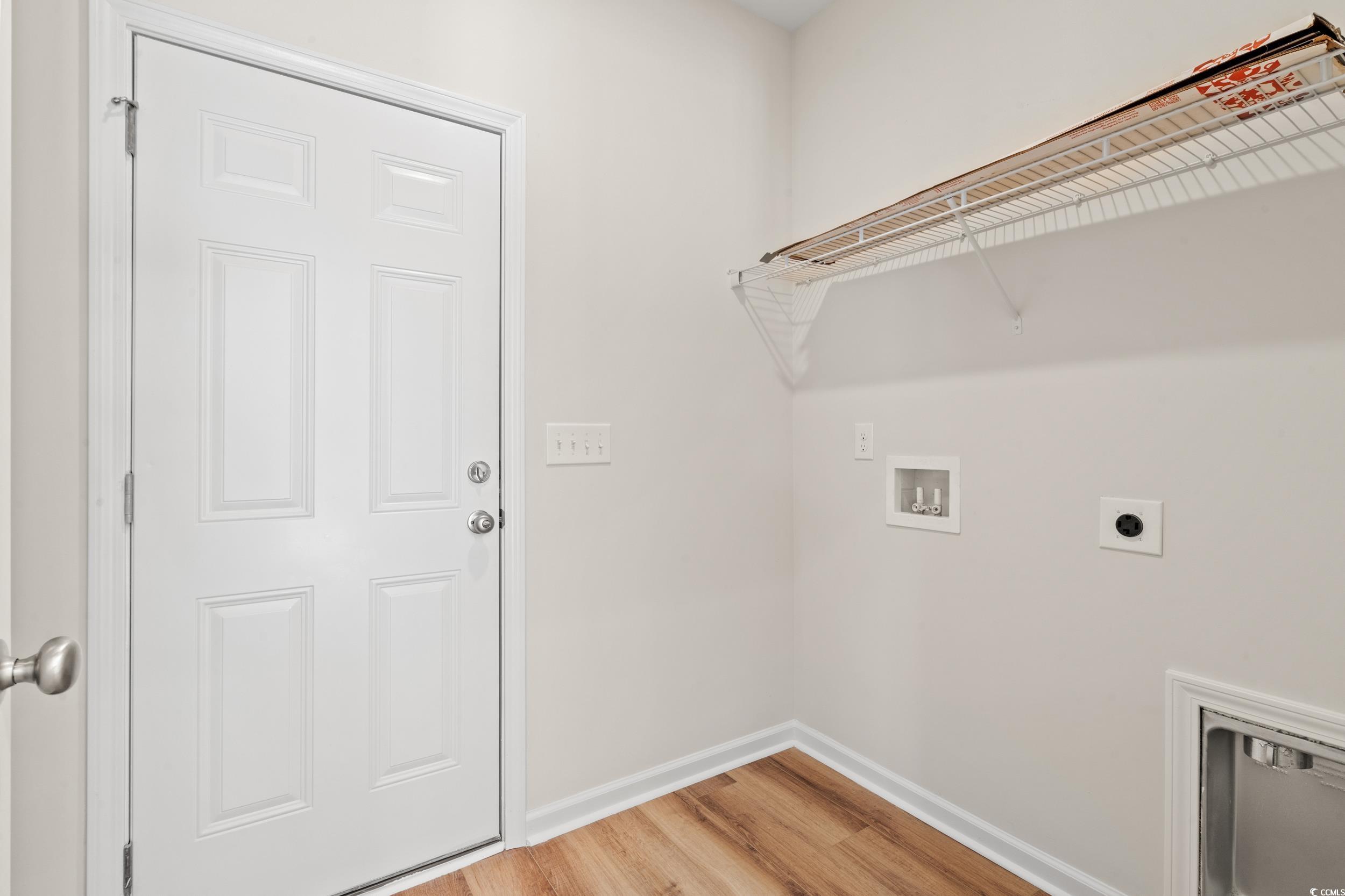 247 Stillbrook Drive Longs, SC 29568 - Photo 15 of 36 Washroom featuring light wood finished floors, washer hookup, and hookup for an electric dryer