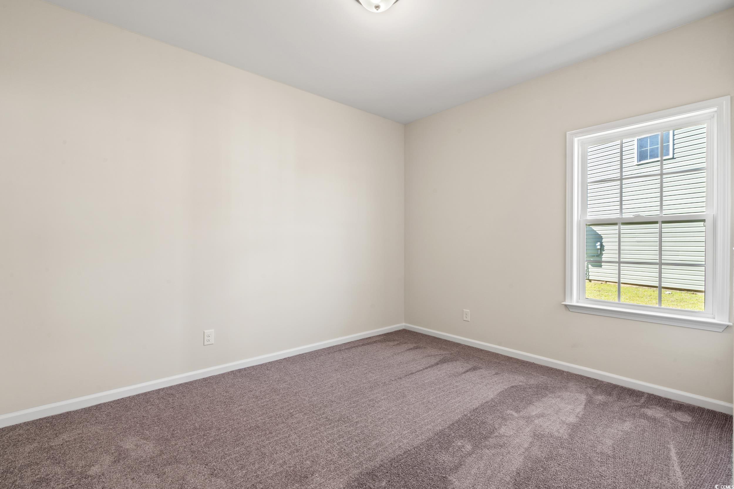 247 Stillbrook Drive Longs, SC 29568 - Photo 6 of 36 Carpeted spare room with baseboards