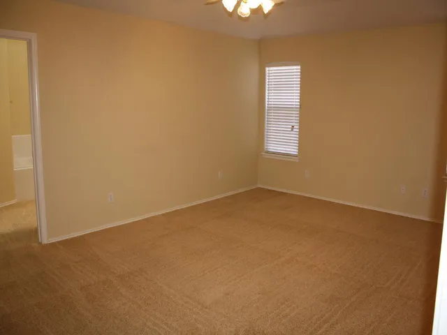 an empty room with a window