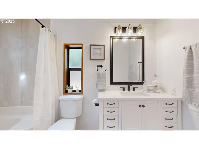 a bathroom with a sink and bathtub