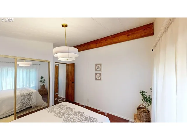 a bathroom with a sink mirror and vanity