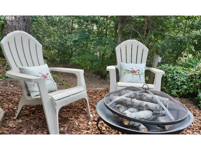 a view of balcony with furniture