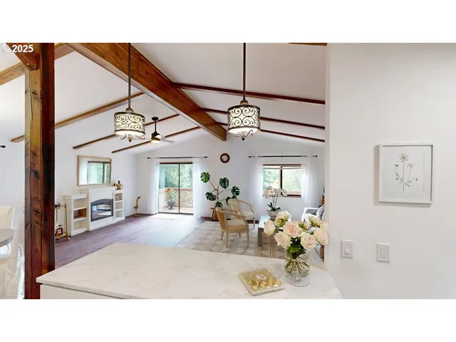 a kitchen with appliances a sink and cabinets