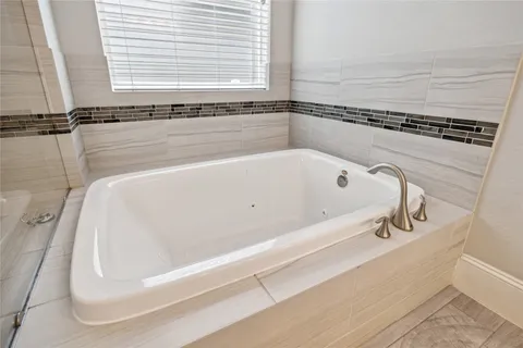 a bathroom with a bathtub