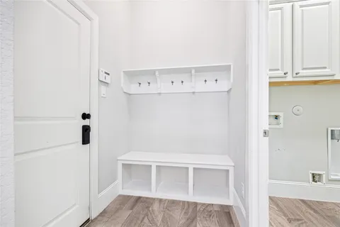 a view of walk in closet with window