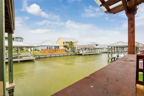 a view of a city with lawn chairs