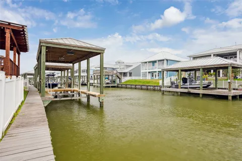 a view of swimming pool with outdoor seating and yard