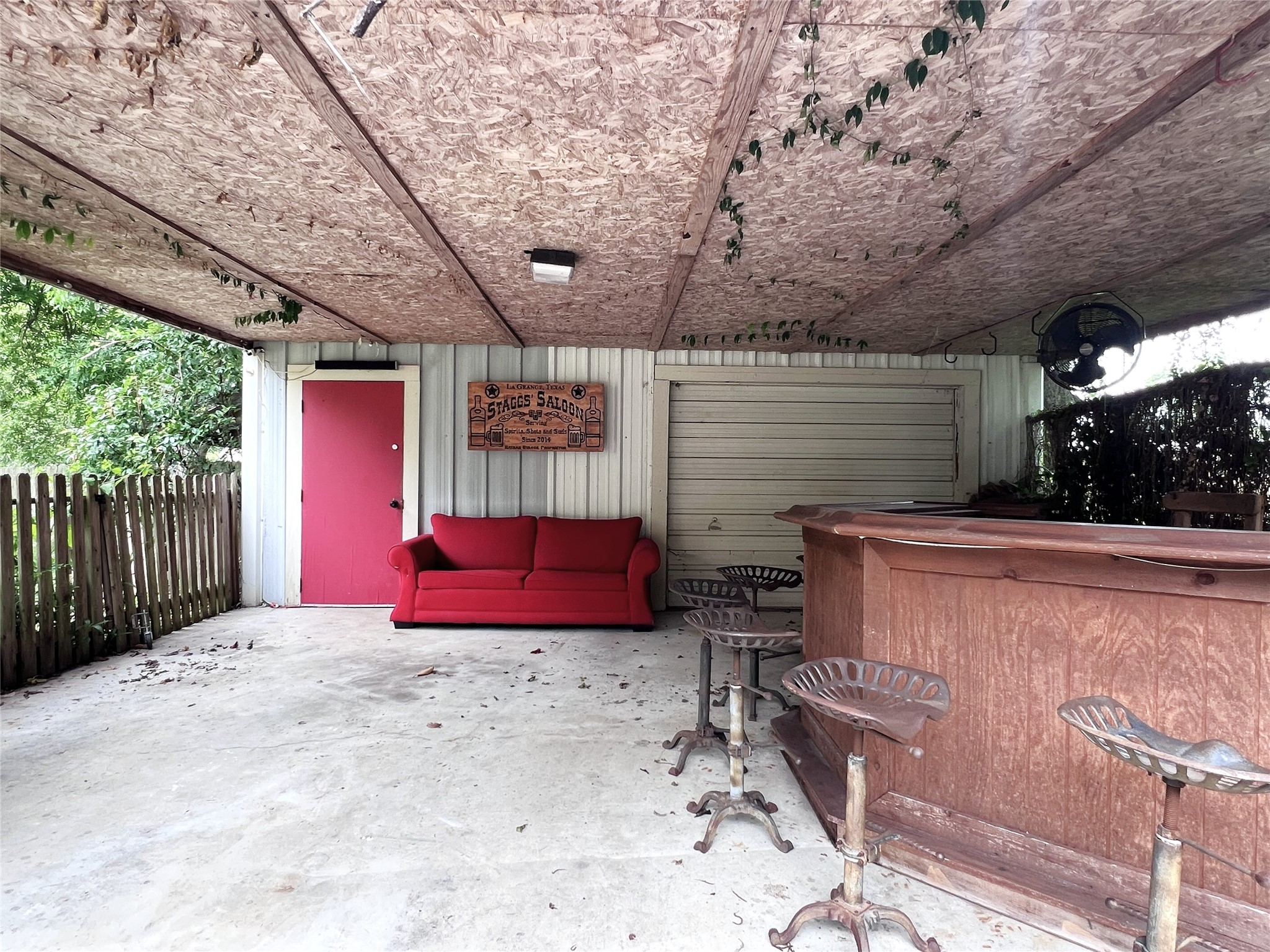 606 Sycamore Street Brenham, TX 77833 - Photo 23 of 27 a view of a backyard with furniture