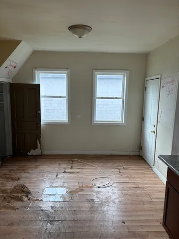 an empty room with windows