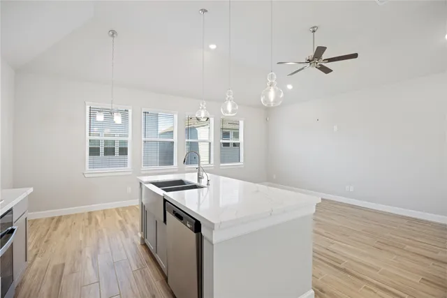 a bathroom with a toilet a sink and a mirror