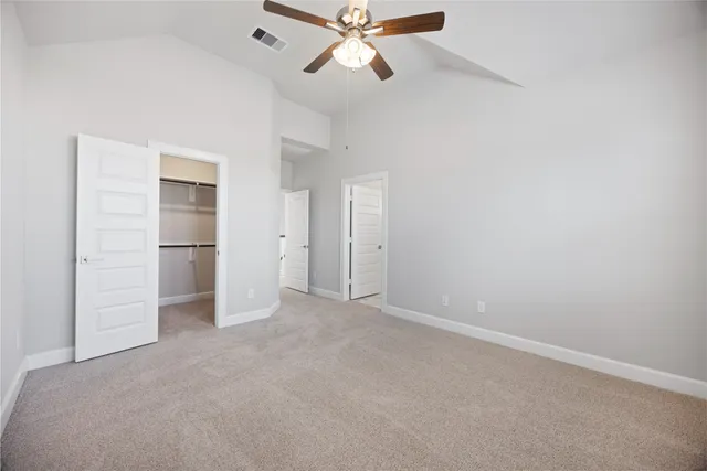 a bathroom with a double vanity sink mirror and shower
