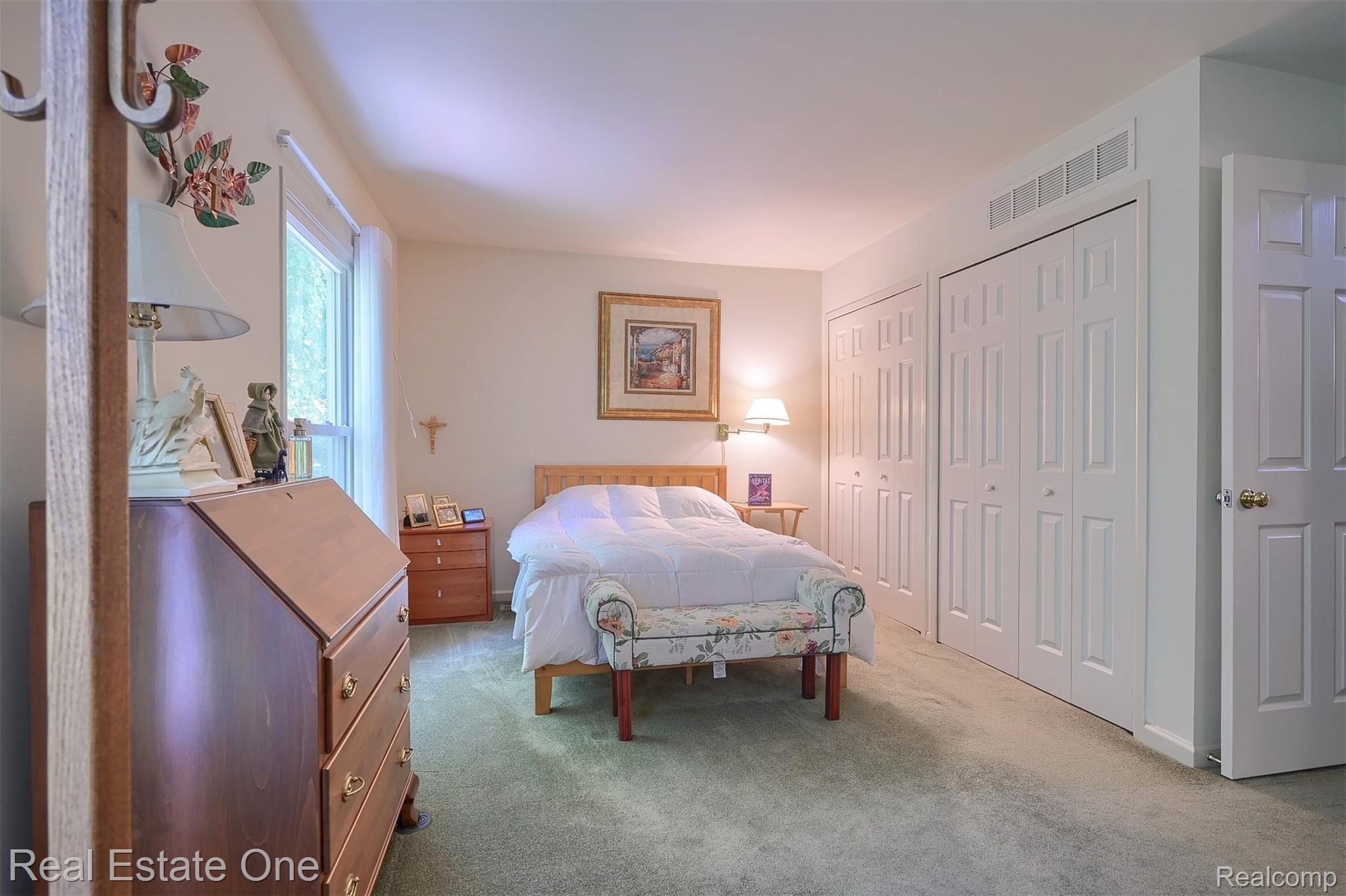 1542 Hidden Valley Lane, Unit 203 Rochester, MI 48306 - Photo 19 of 30 Owner's Bedroom with Three "California Closet" Systems