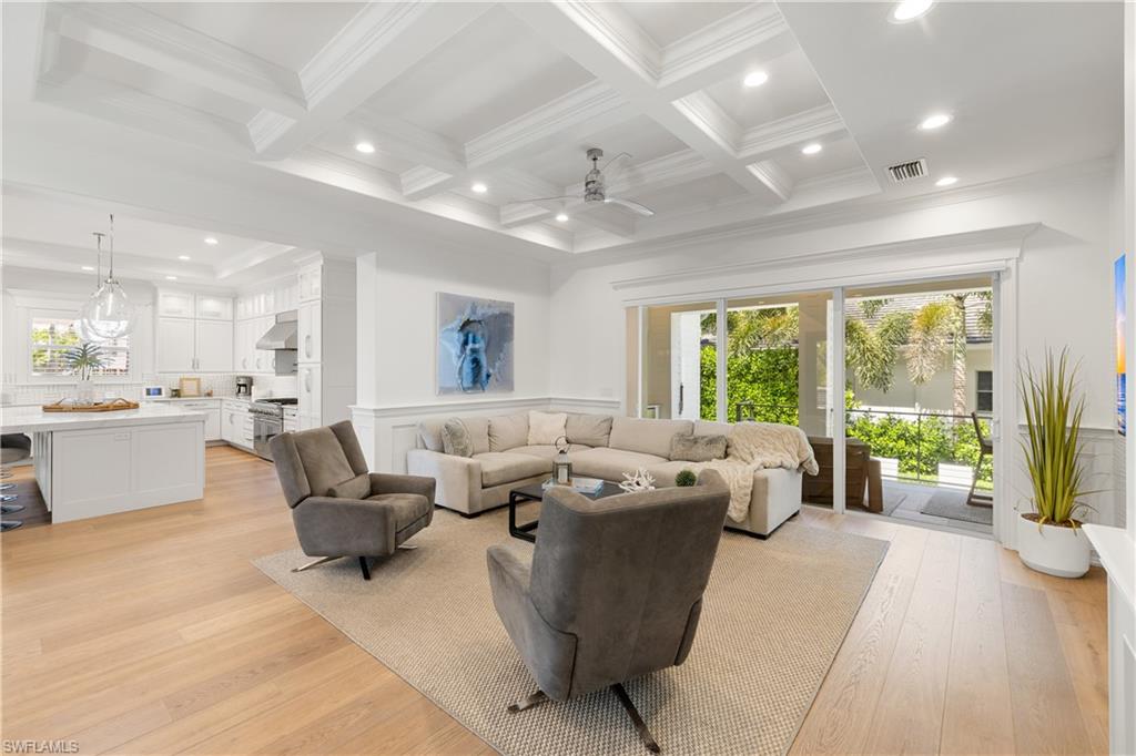 950 8th Street South Naples, FL 34102 - Photo 6 of 21 a living room with furniture and a large window
