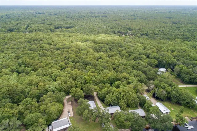 a view of a field with an outdoor space