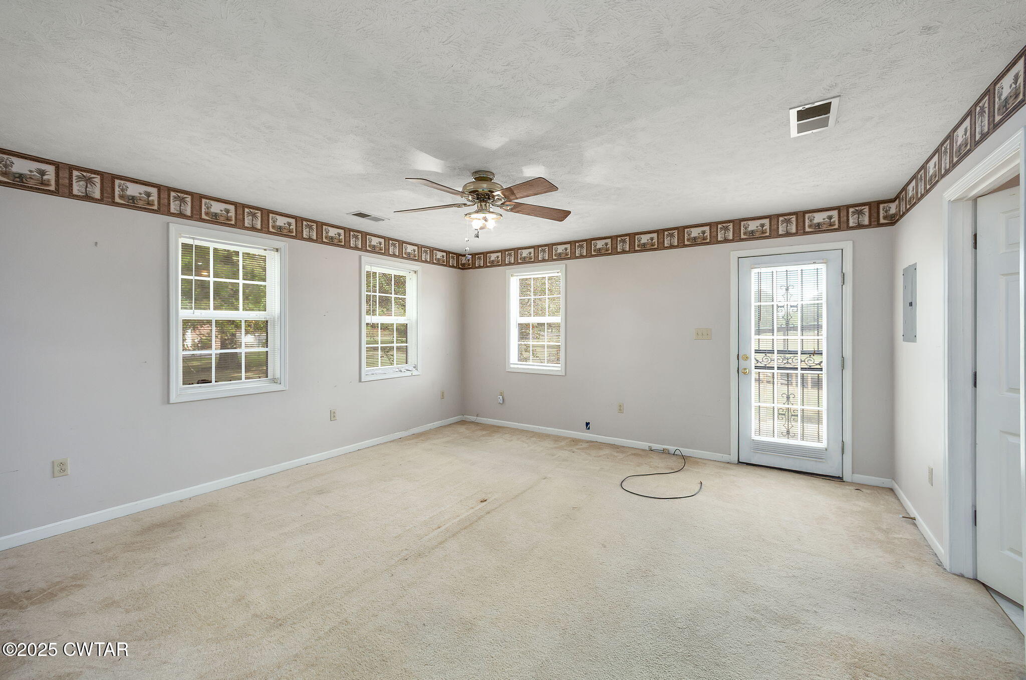 598 Old Bells Road Jackson, TN 38305 - Photo 18 of 40 a view of an empty room with a window