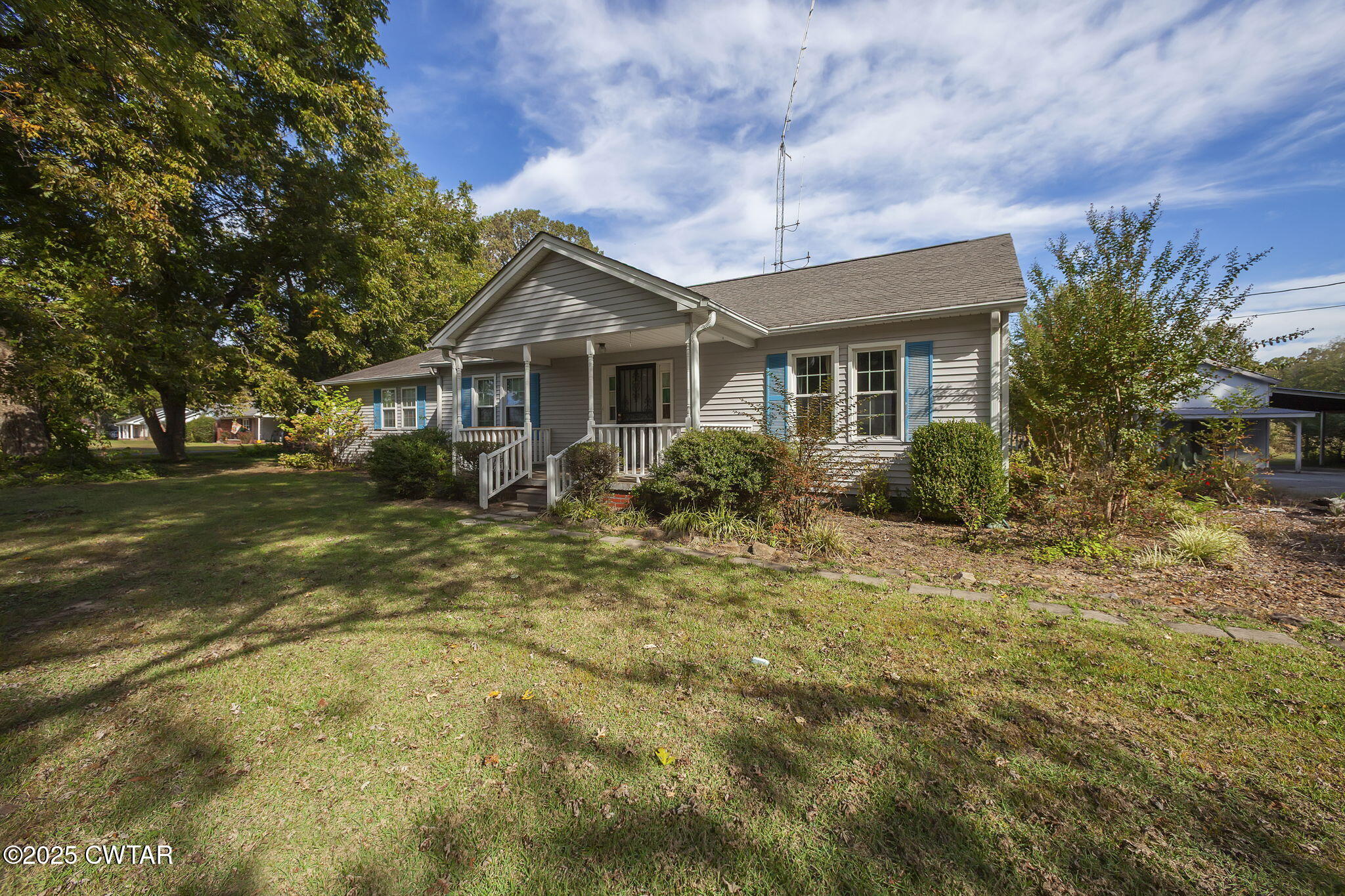 598 Old Bells Road Jackson, TN 38305 - Photo 2 of 40 a front view of house with yard and trees around
