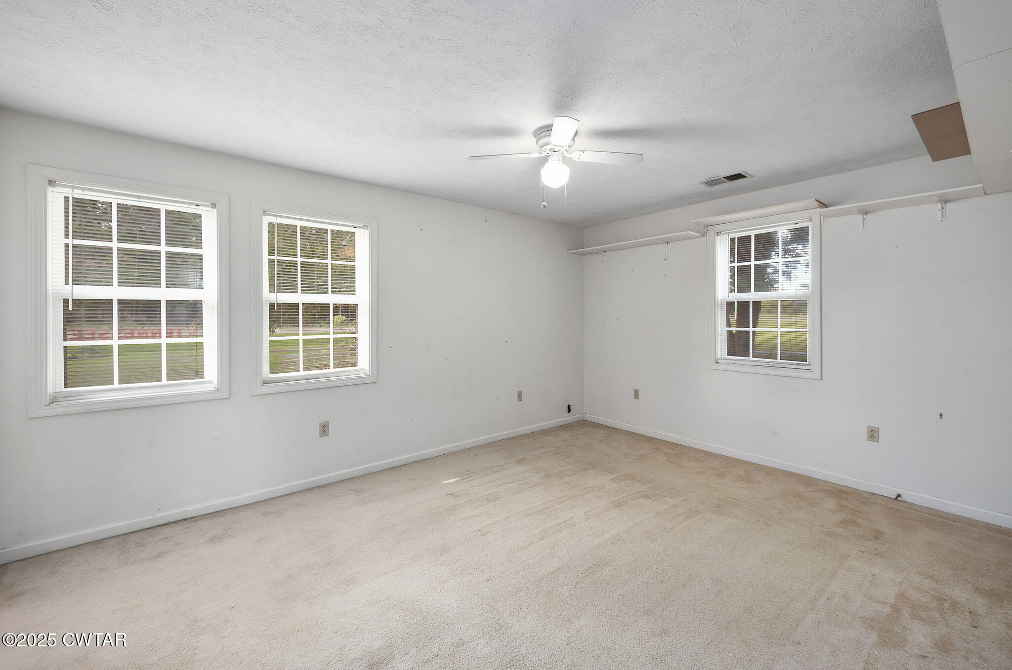 598 Old Bells Road Jackson, TN 38305 - Photo 23 of 40 a view of an empty room with a window