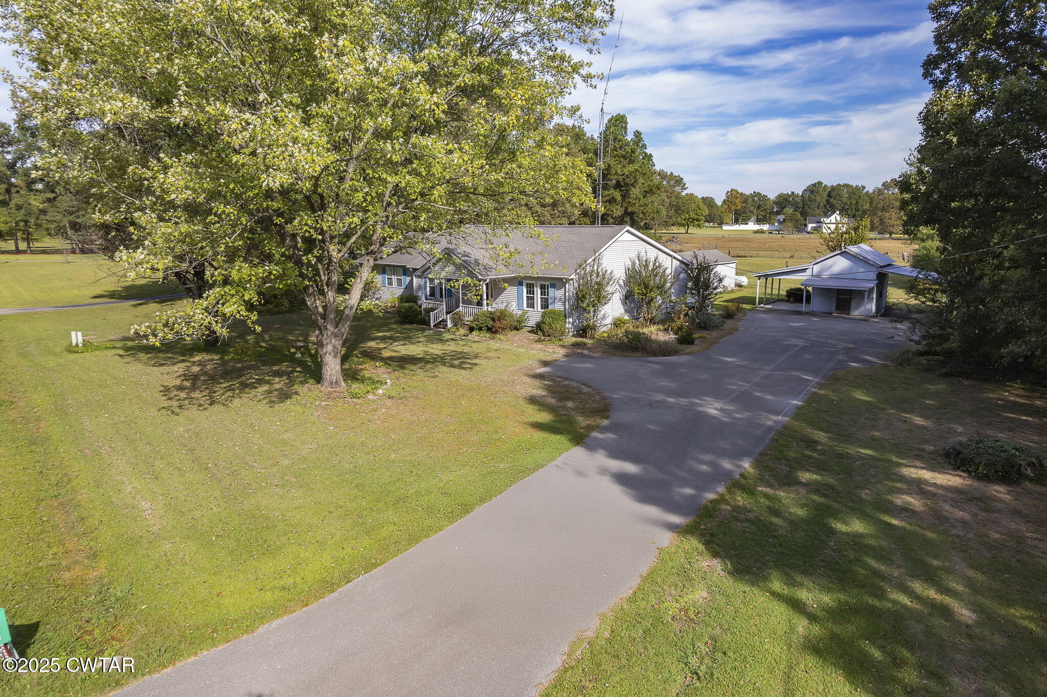 598 Old Bells Road Jackson, TN 38305 - Photo 32 of 40 a view of a lake with houses