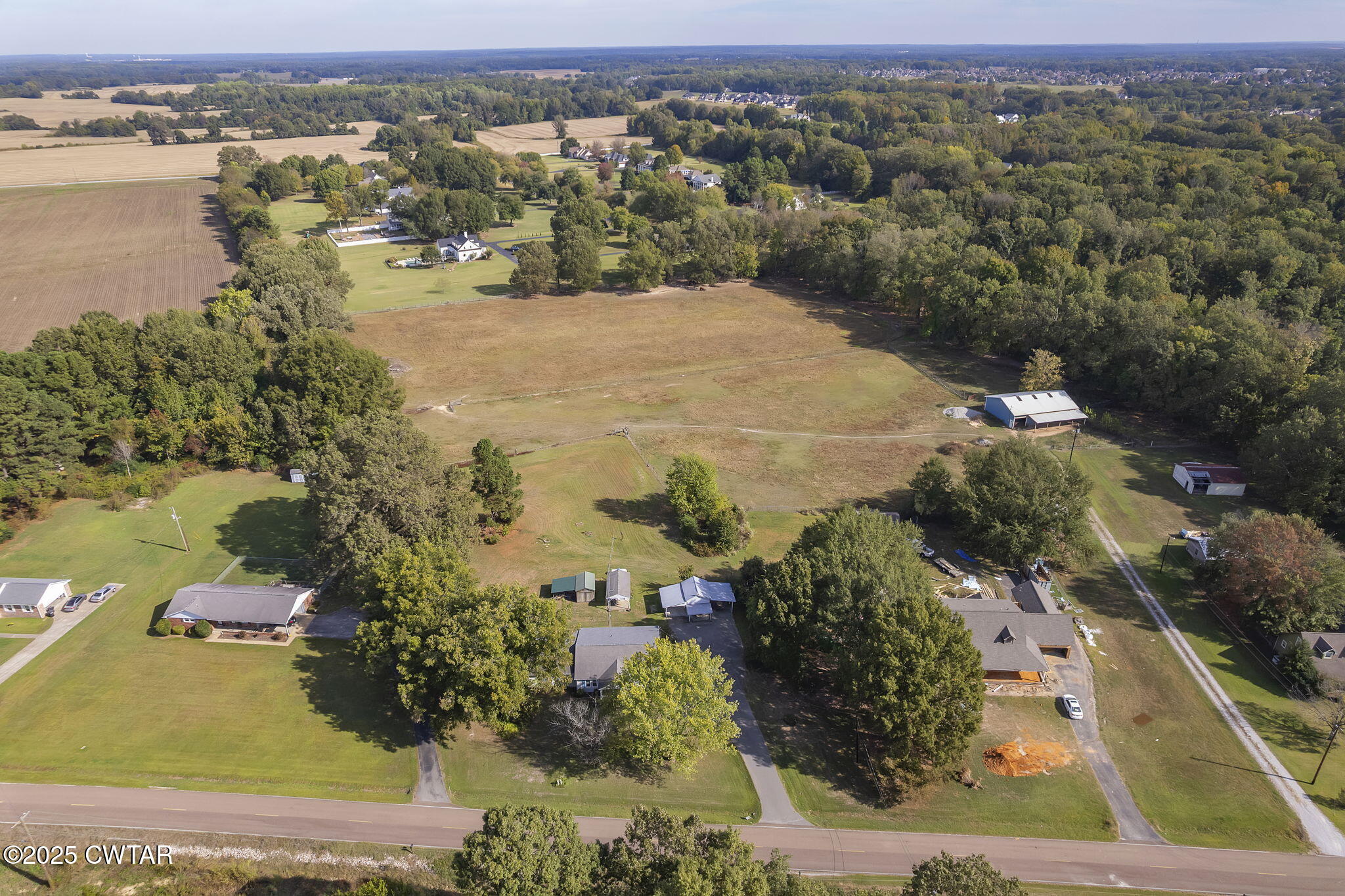 598 Old Bells Road Jackson, TN 38305 - Photo 33 of 40 an aerial view of residential houses with outdoor space