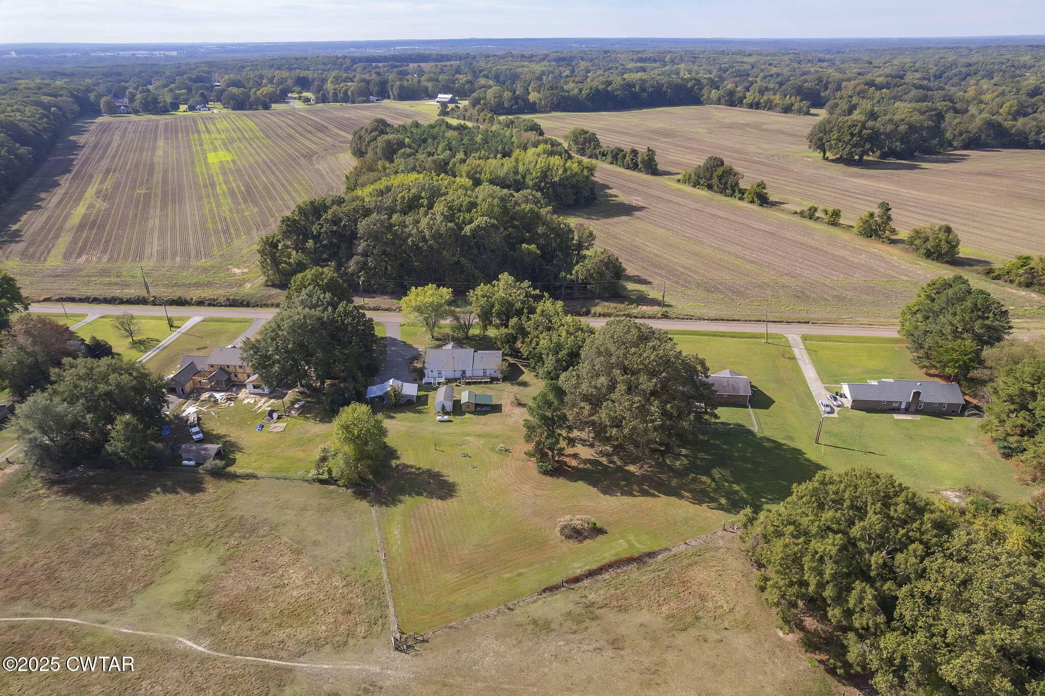 598 Old Bells Road Jackson, TN 38305 - Photo 37 of 40 a view of a lake with a mountain in the background