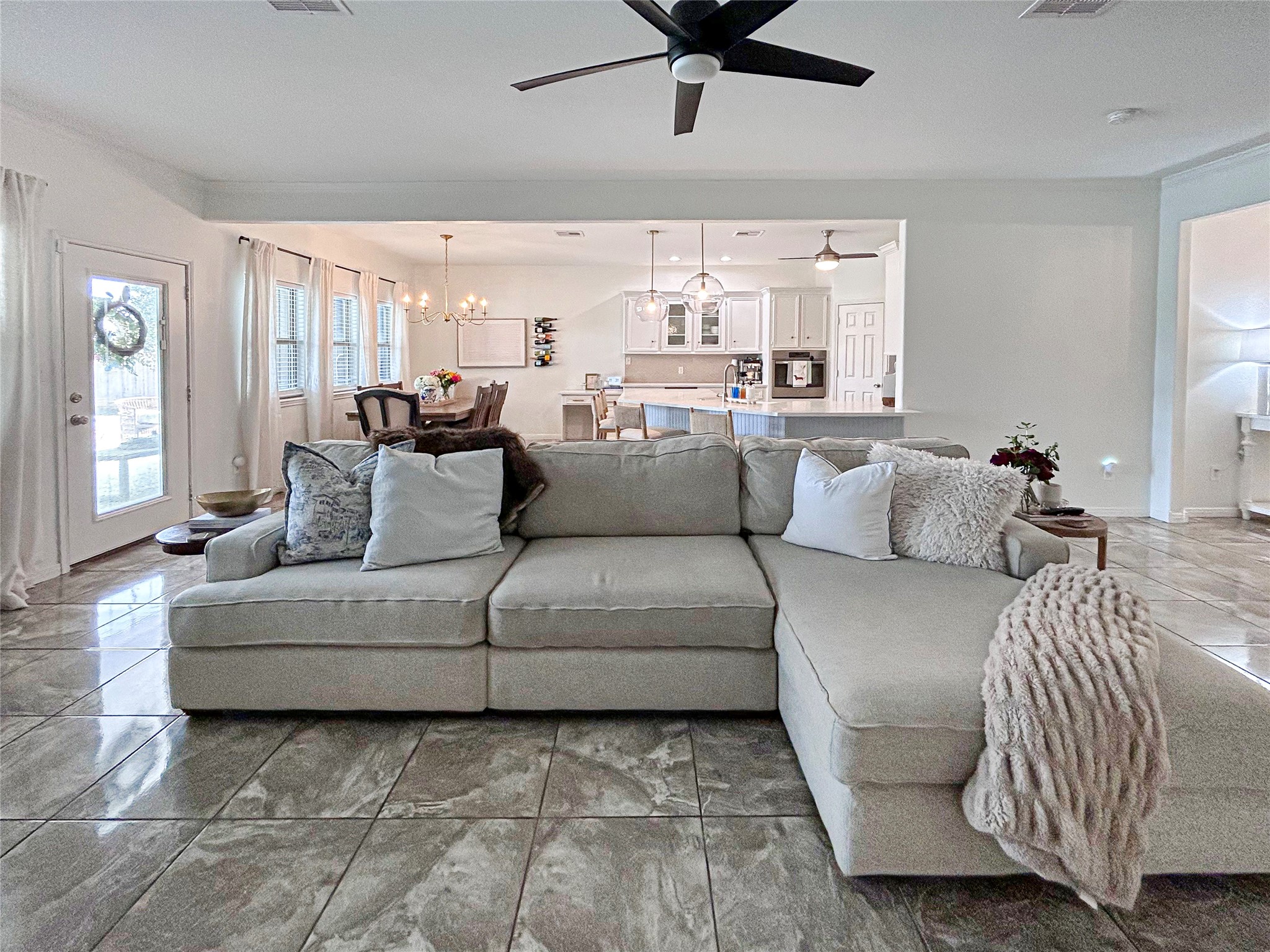 626 Sunset Trail Angleton, TX 77515 - Photo 12 of 43 a living room with furniture and a large window